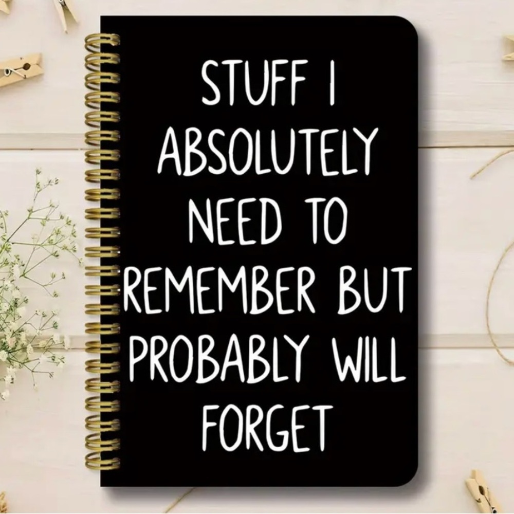 Black Spiral Notebook with White Text